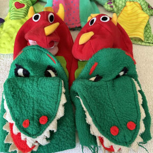 A lot of Kids II Dragon & Crocodile Hand Puppets One Size